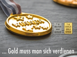 Feingoldbarren und Silberbarren je 1g in der Motivbox. Silber bekommt man geschenkt, Gold muss man sich verdienen